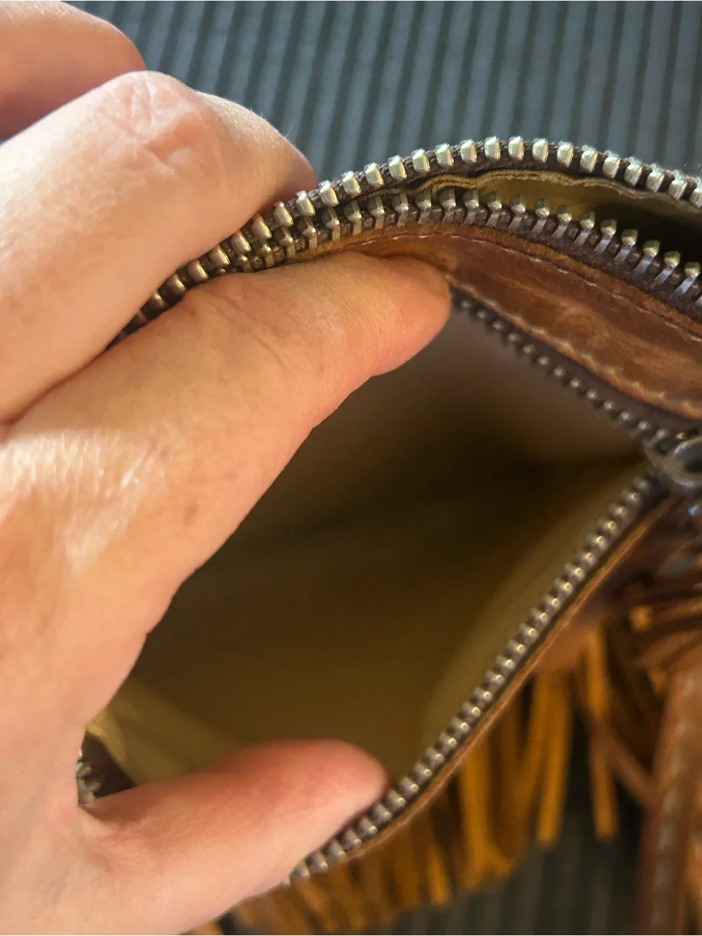 Roots, genuine leather, made in Canada Fringed Crossbody